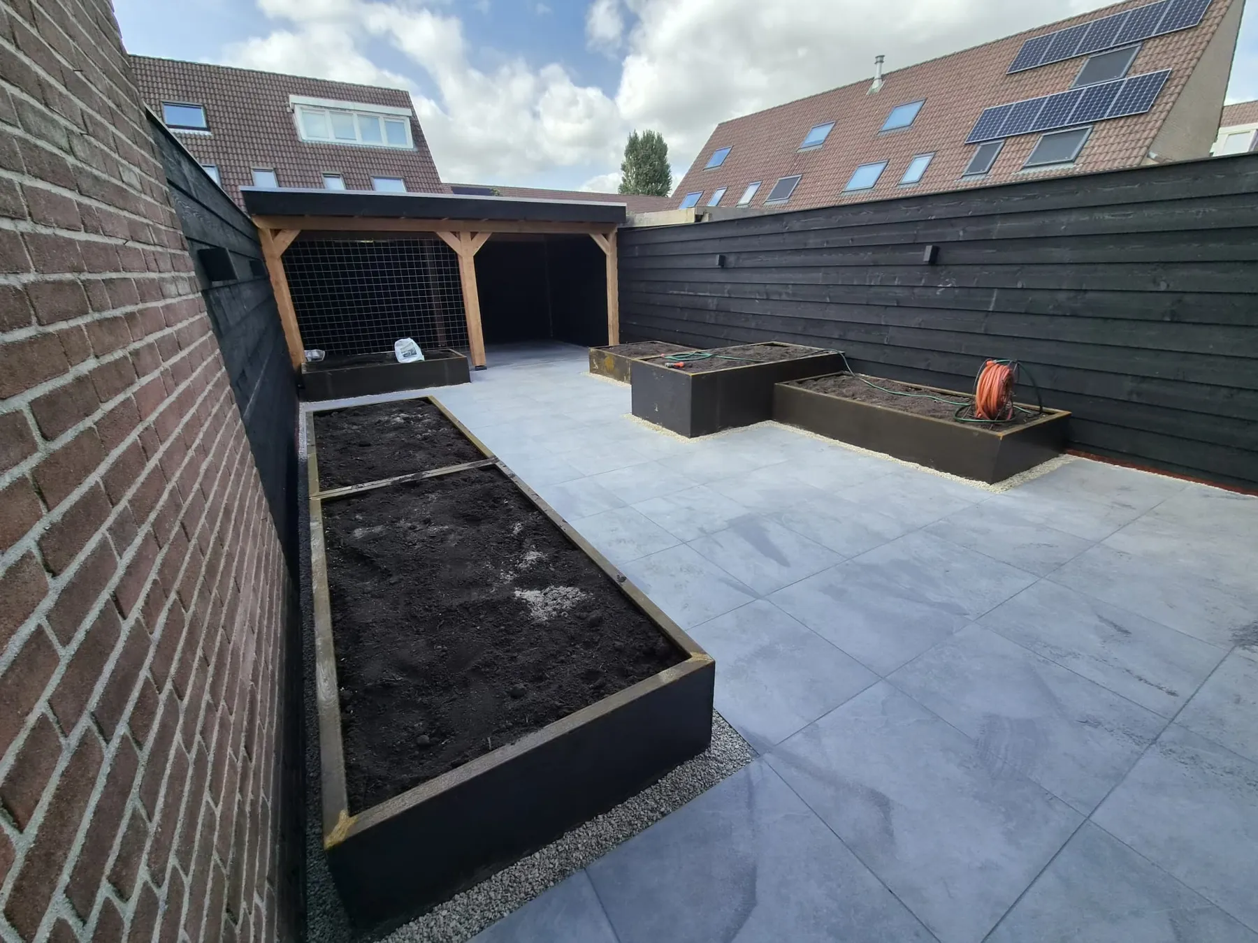 Achtertuin van wildgroei naar strak